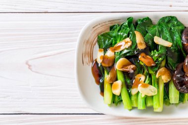 Sarımsaklı istiridye soslu kızarmış Hong Kong Kale heyecan