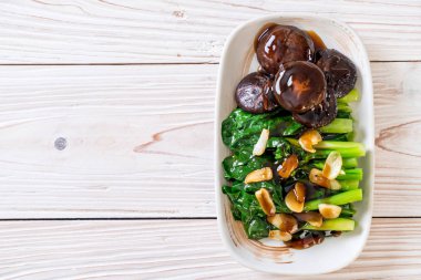 Sarımsaklı istiridye soslu kızarmış Hong Kong Kale heyecan