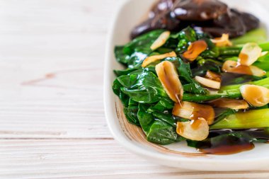 Sarımsaklı istiridye soslu kızarmış Hong Kong Kale heyecan