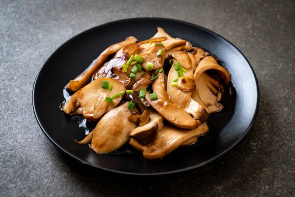 stir-fried king oyster mushroom in oyster sauce - healthy, vegan or vegetarian food style