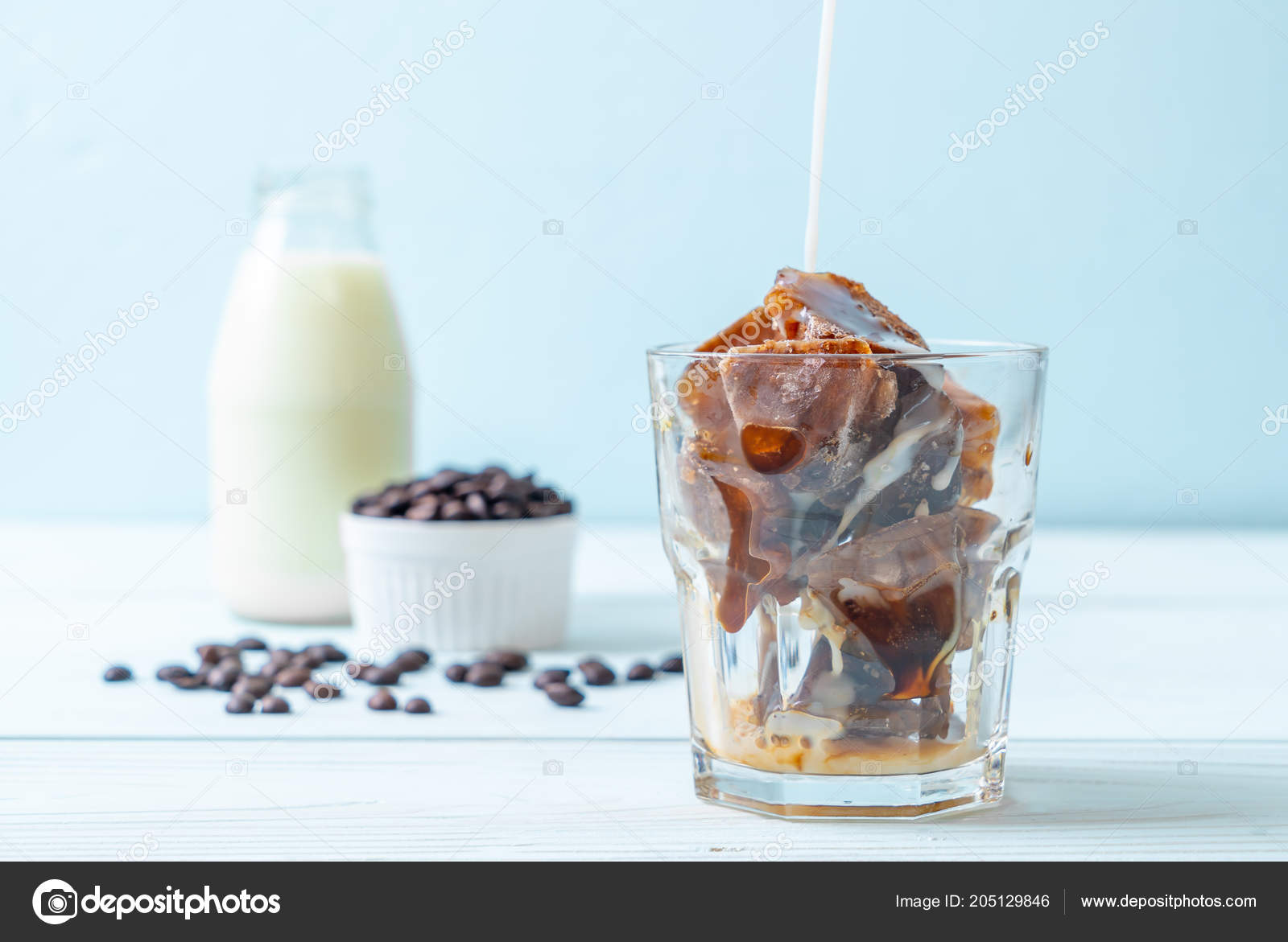 Coffee Ice Cubes Milk Wood Table Stock Photo Topntp 205129846 Coffee Ice Cubes Milk Wood Table Stock Photo