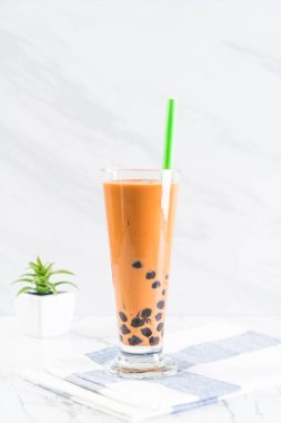 iced thai milk tea with bubble clipart