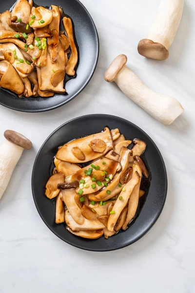 stir-fried king oyster mushroom in oyster sauce - healthy, vegan or vegetarian food style