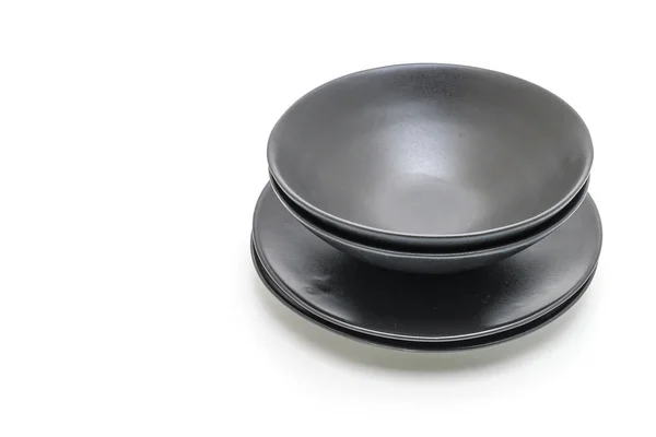 Schwarzer Teller und Schale isoliert auf weißem Hintergrund — Stockfoto