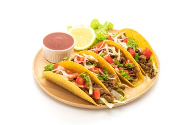 et ve beyaz arka plan üzerinde - Meksika yemeği stil izole sebze ile tacos