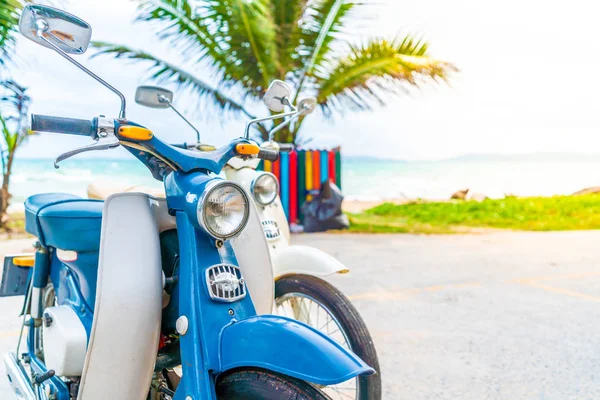 Old and classic bike with sea background - vacation concept
