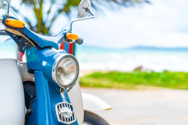 Old and classic bike with sea background - vacation concept
