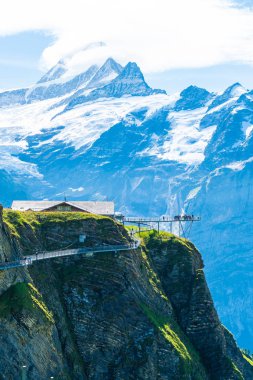 Sky cliff walk on First peak of Alps mountain at Grindelwald Switzerland. clipart