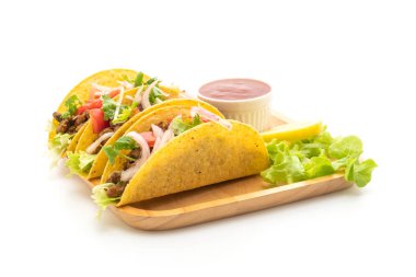 et ve beyaz arka plan üzerinde - Meksika yemeği stil izole sebze ile tacos