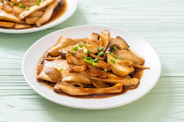 stir-fried king oyster mushroom in oyster sauce - healthy, vegan or vegetarian food style