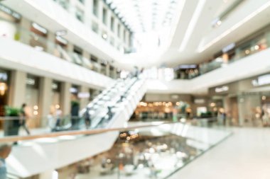 Bokeh ile soyut bulanıklık ve arka plan için mağazadaki dağıtılmış alışveriş merkezleri