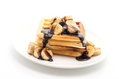 beyaz zemin üzerine çikolata ile muz gözleme