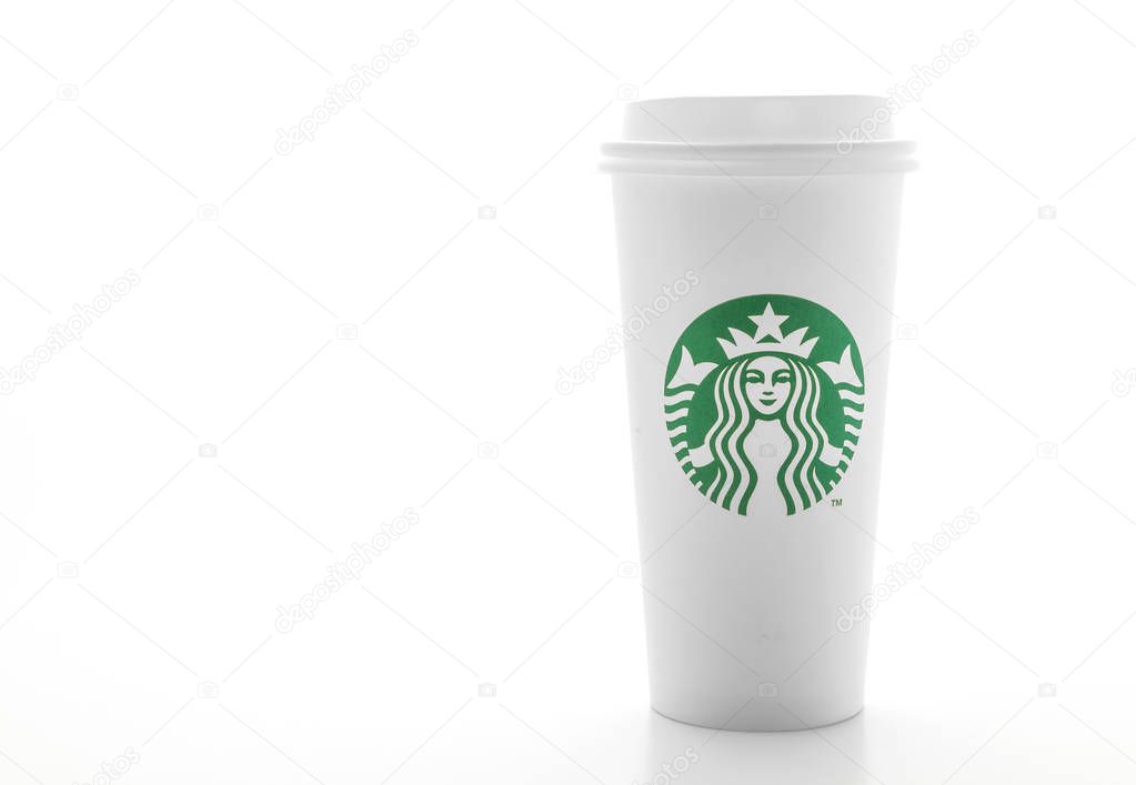 BANGKOK, THAILAND - JUN 5, 2018: White coffee cup with Starbucks logo isolated on white background. Starbucks is the world's largest coffee house with over 20,000 stores in 61 countries.