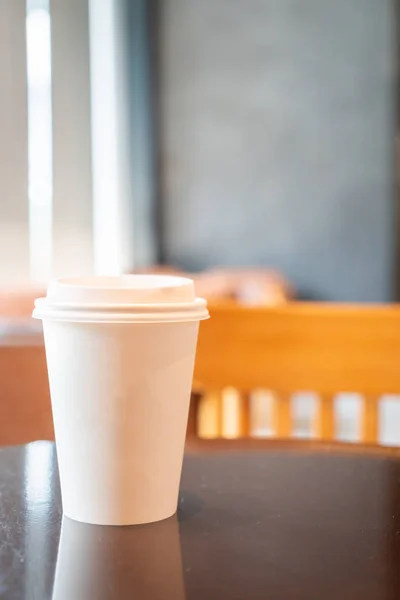 hot coffee paper cup in coffee shop and cafe