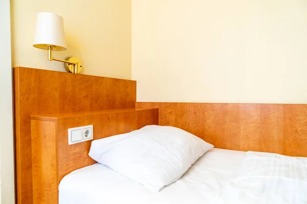 white pillows on bed decoration in bedroom interior