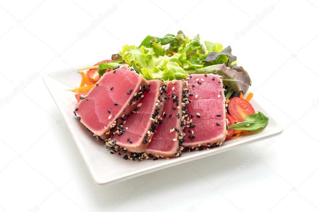 fresh tuna raw with vegetable salad isolated on white background