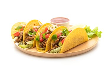 et ve beyaz arka plan üzerinde - Meksika yemeği stil izole sebze ile tacos