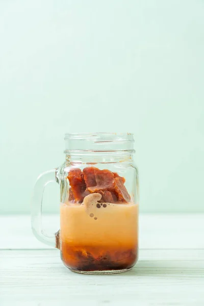 Thai Tea Ice Cube Milk Wood Background — Stock Photo, Image