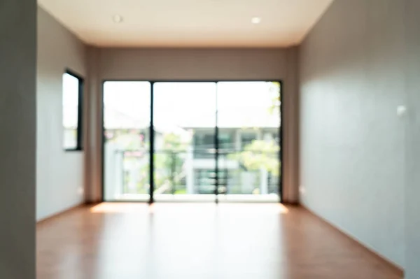 abstract blur empty room with window and door in home for background