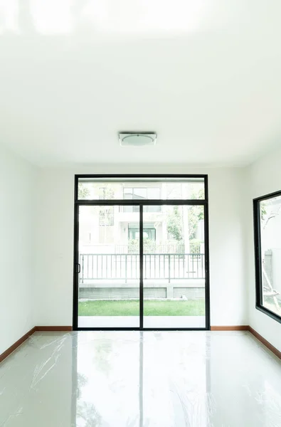 empty glass window and door in home with sunlight