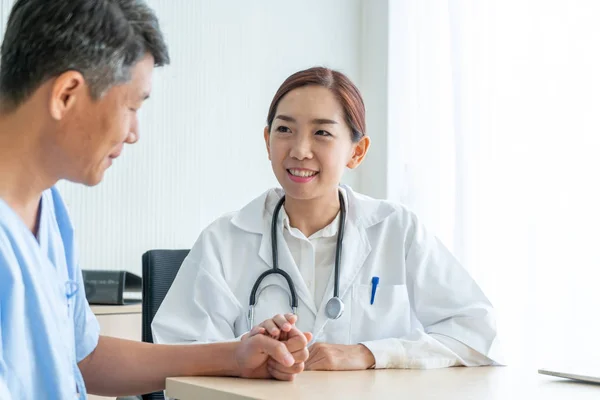 Asian Female Doctor Patient Discussing Something While Sitting Table Selective Stock Picture