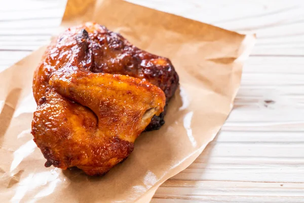 stock image grilled and barbecue chicken on table