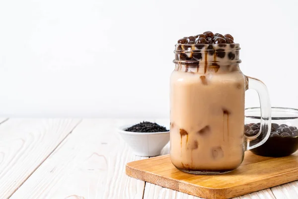 Taiwan milk tea with bubble on wood background