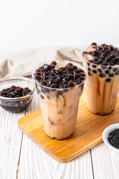 Taiwan milk tea with bubble on wood background