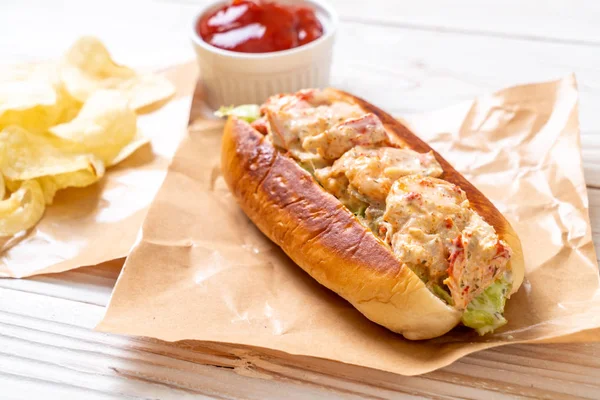 homemade lobster roll with potato chips