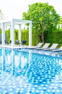 Otel ve tatil seyahat ve tatil için açık yüzme havuzunda havuzuyla yatak