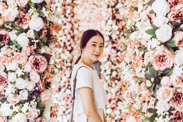 beautiful Asian woman with flower arches - valentine concept