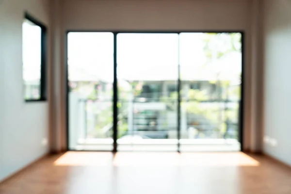 abstract blur empty room with window and door in home for background