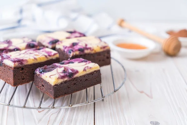 blueberry cheese brownies cake on plate