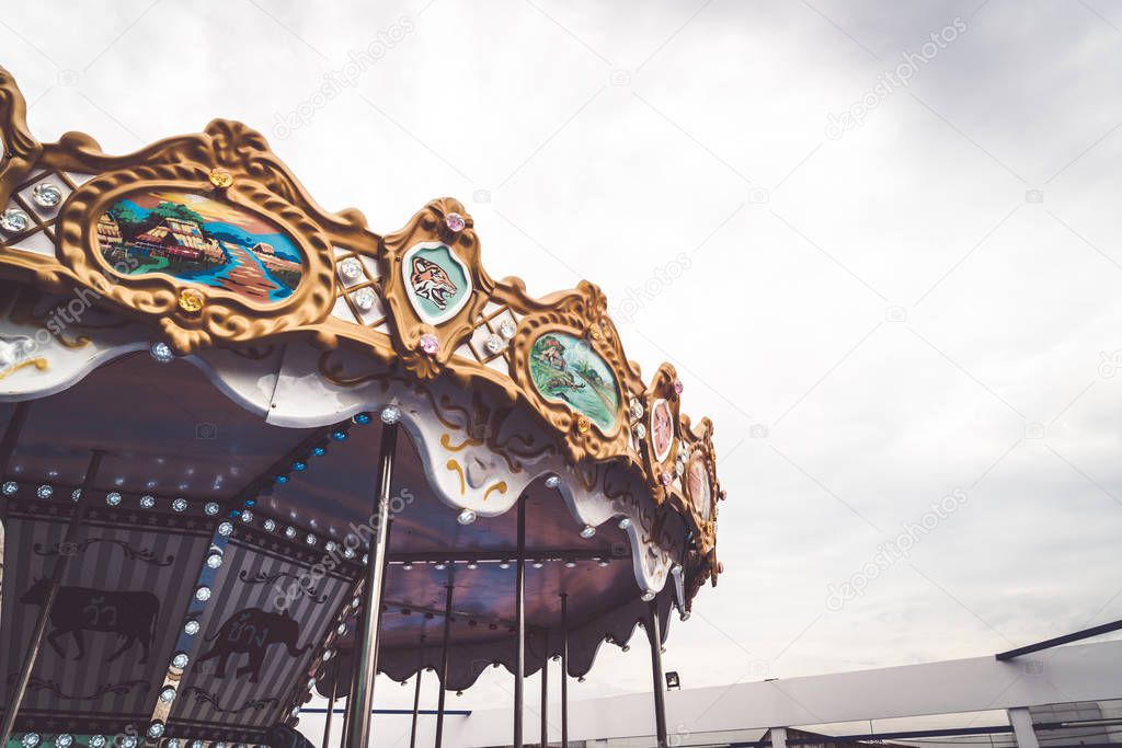 Children's Carousel at an amusement park - vintage effect filter