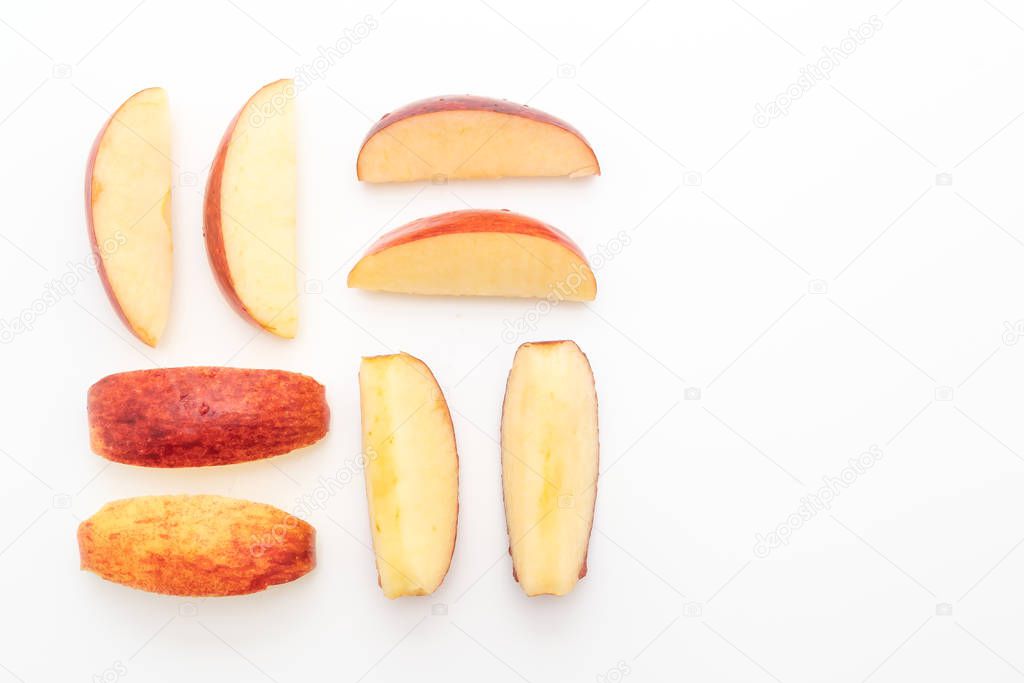 fresh red apples sliced isolated on white background