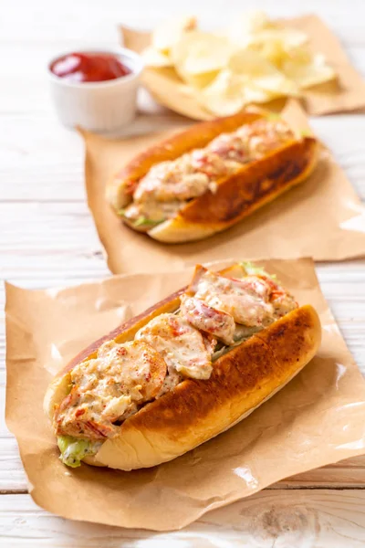 homemade lobster roll with potato chips