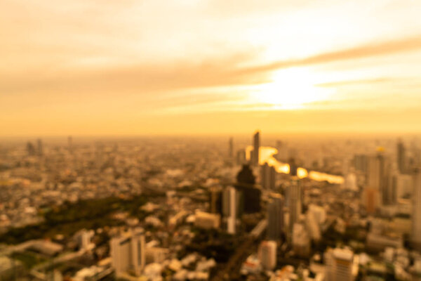 Abstract blur Bangkok cityscape in Thailand with sunset sky for background