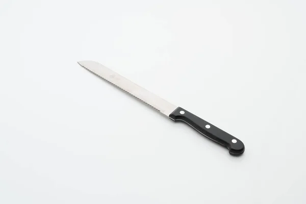 Utensilio cuchillo sobre fondo blanco — Foto de Stock