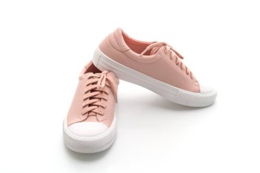 Beyaz arka plan üzerinde pembe spor ayakkabı ayakkabı