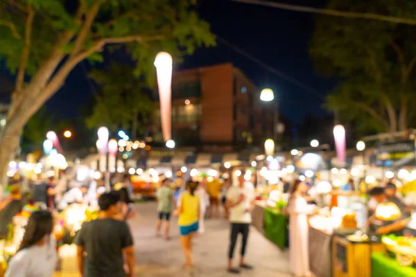 Difuminación abstracta y mercado callejero nocturno desenfocado — Foto de Stock