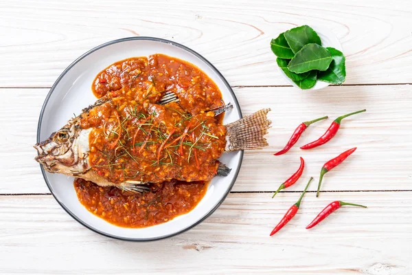 Fried fish with chili sauce — Stock Photo, Image