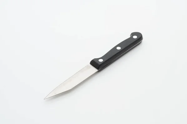 Ustensile de couteau sur fond blanc — Photo
