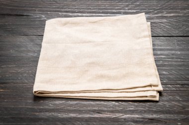 ahşap arka plan üzerinde mutfak bezi (peçete)