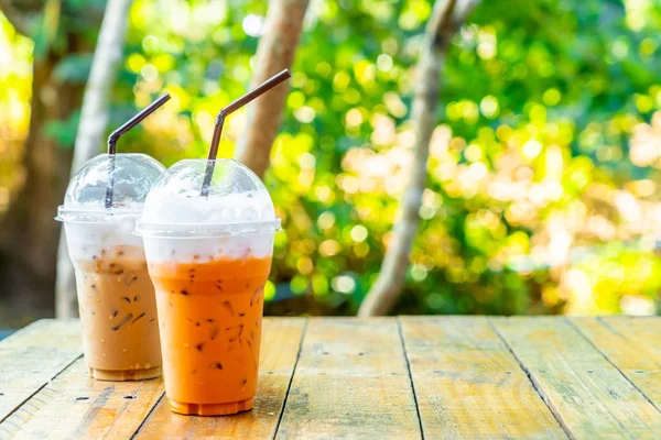 Iced Thai milk tea and iced coffee latte cup — Stock Photo, Image