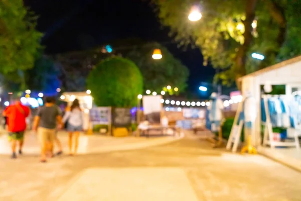 Difuminación abstracta y mercado callejero nocturno desenfocado — Foto de Stock