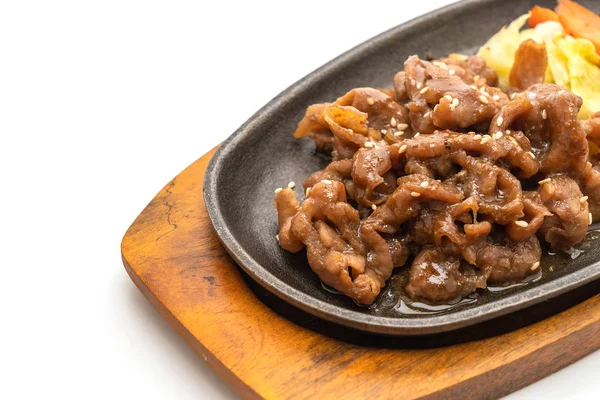 Sliced pork steak on hot plate — Stock Photo, Image