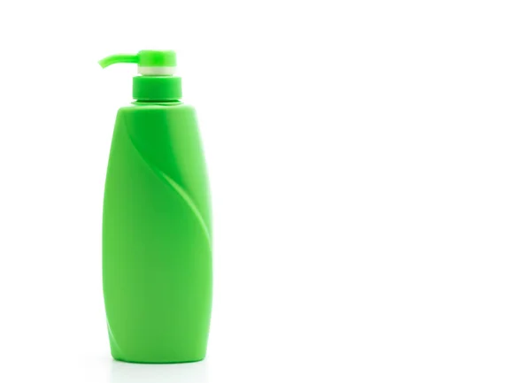 Botella de champú o acondicionador de cabello sobre fondo blanco — Foto de Stock