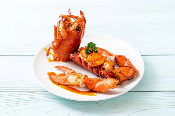 Bife de cauda de lagosta com molho — Fotografia de Stock