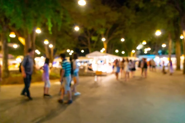 Difuminación abstracta y mercado callejero nocturno desenfocado — Foto de Stock