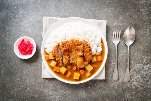 Knusprig gebratenes Schweineschnitzel mit Curry und Reis — Stockfoto